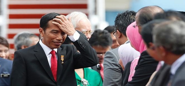 JOKOWI DI BAWAH LIMA TEKANAN BERAT